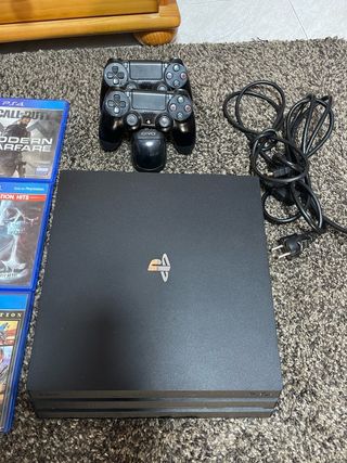 Consola PS4 Pro Negra + 2 Mandos + soporte caga