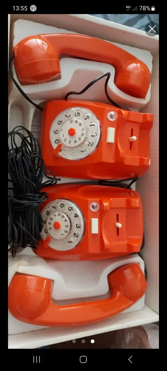 Pareja teléfonos antiguos naranja caja original