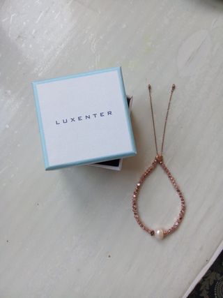 Pulsera Luxenter perla y cuentas doradas