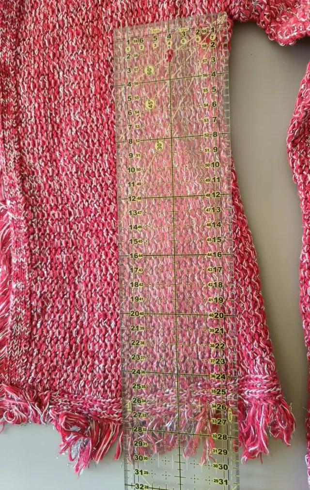 Chaqueta tejida roja con flecos