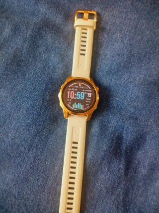 Garmin fenix 7s zafiro Solar Oro + correa metal