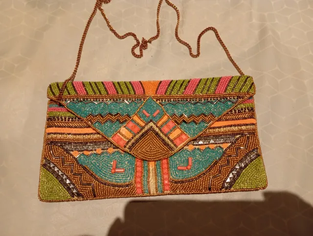 Cartera de mano Sfera bordada