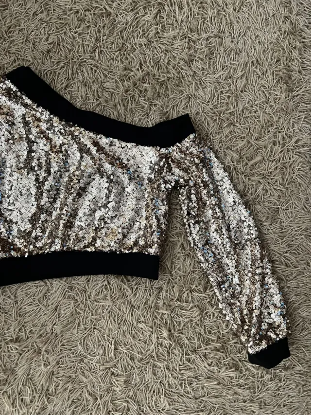 Top fiesta lentejuelas un hombro