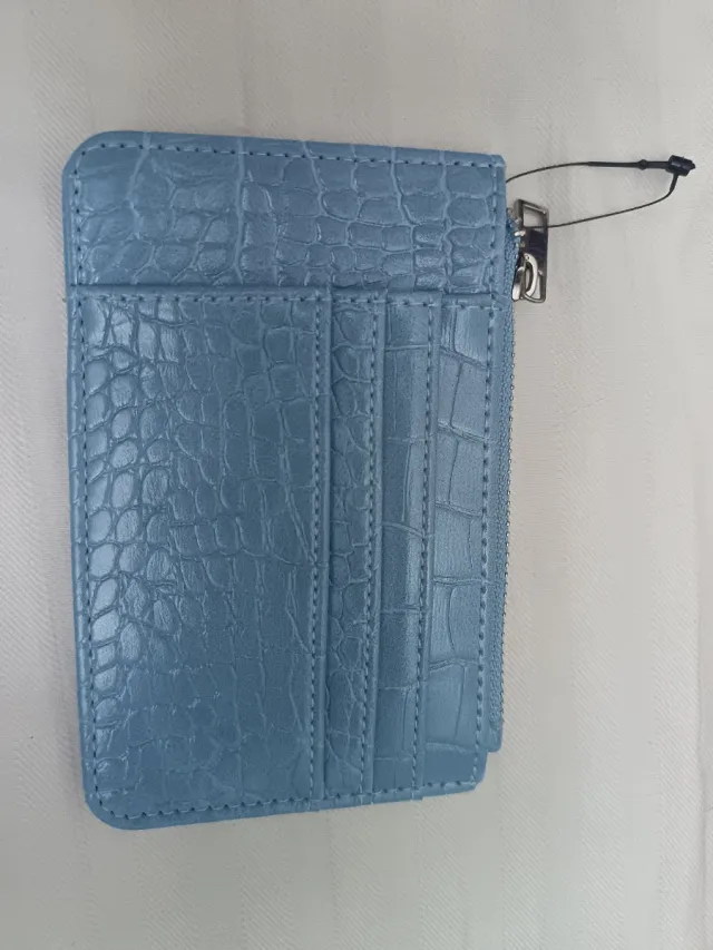 Tarjetero azul con cremallera