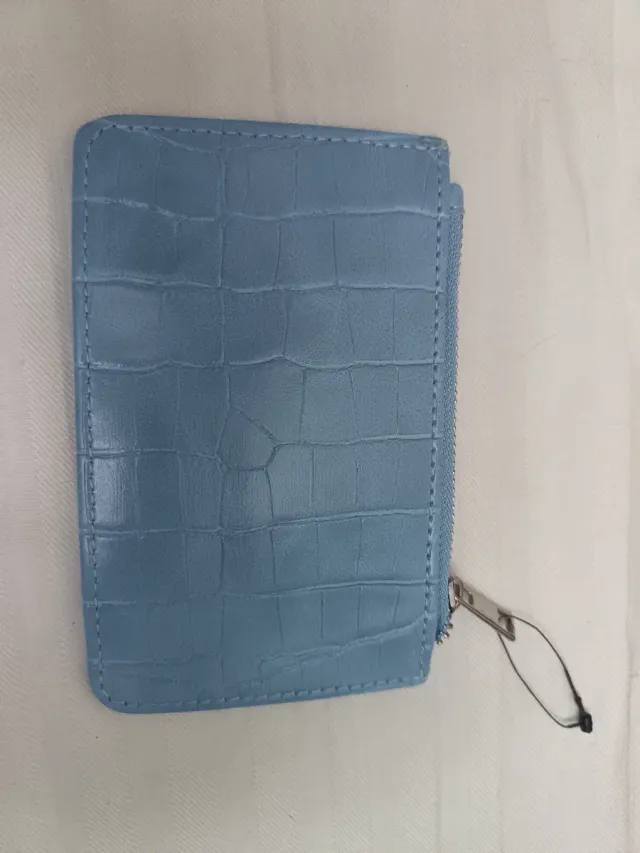 Tarjetero azul con cremallera