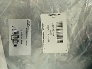 Mochila Audi Negra cruzada.