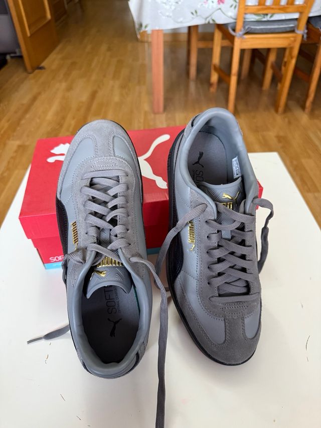 Zapatillas Puma grises y doradas