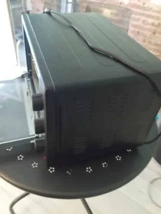 Horno Eléctrico marca Jata capacidad 28L