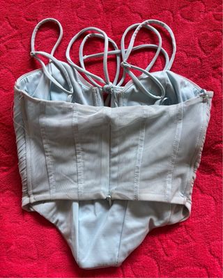 Top azul claro con lazo