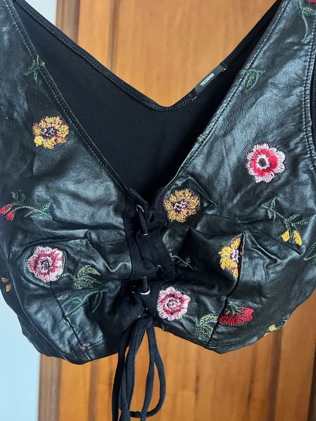 Corpetto floreale in similpelle