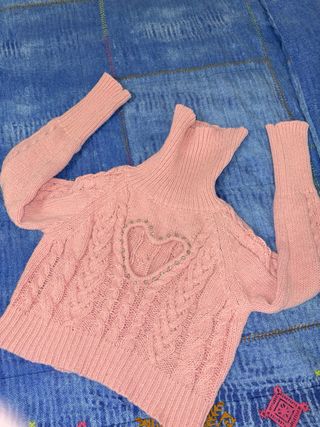 Maglione rosa con cuore e strass