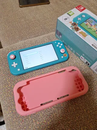 Nintendo Switch Lite Blu con custodia rosa
