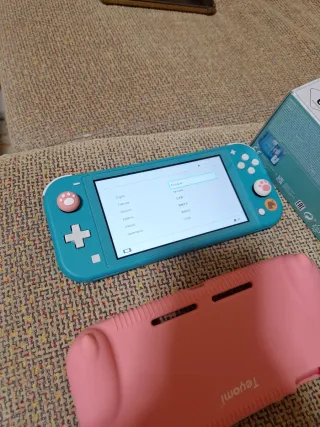 Nintendo Switch Lite Blu con custodia rosa
