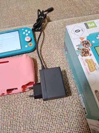Nintendo Switch Lite Blu con custodia rosa