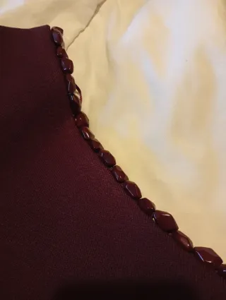 Top asimétrico con pedrería