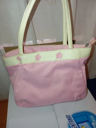 Bolso rosa chicle con flores