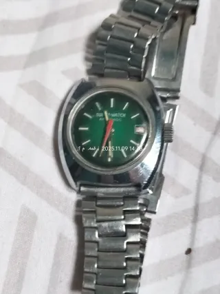 Reloj Swatch Automático Verde y Plateado