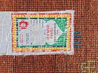 Tappeto arancione e blu per ingresso