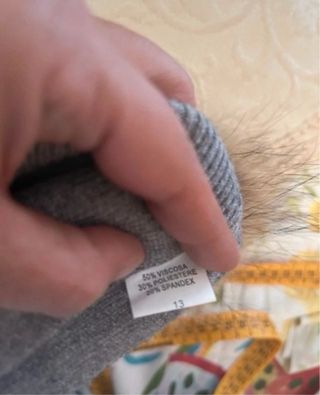 Berretto con pon pon in pelliccia