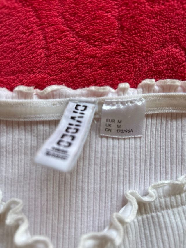 Top blanco escotado manga larga