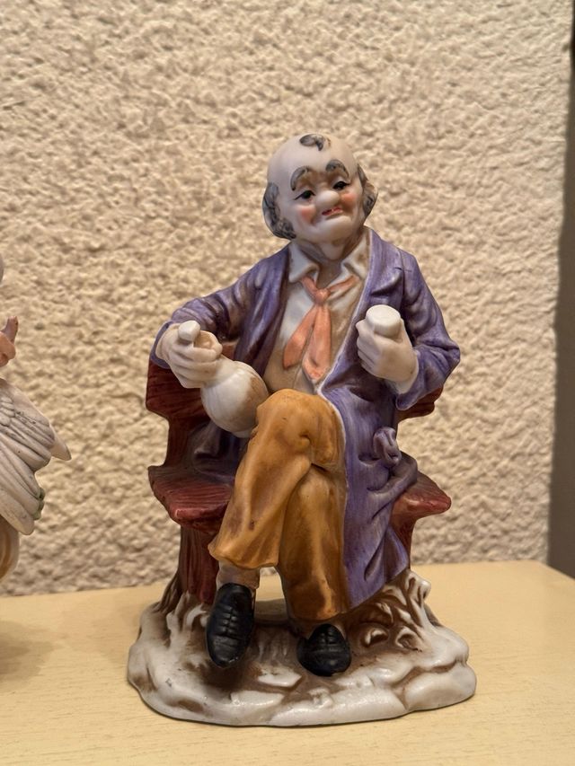 Figuras porcelana ancianos sentados