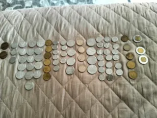 Collezione monete Lire + 2 gettoni telefonici.