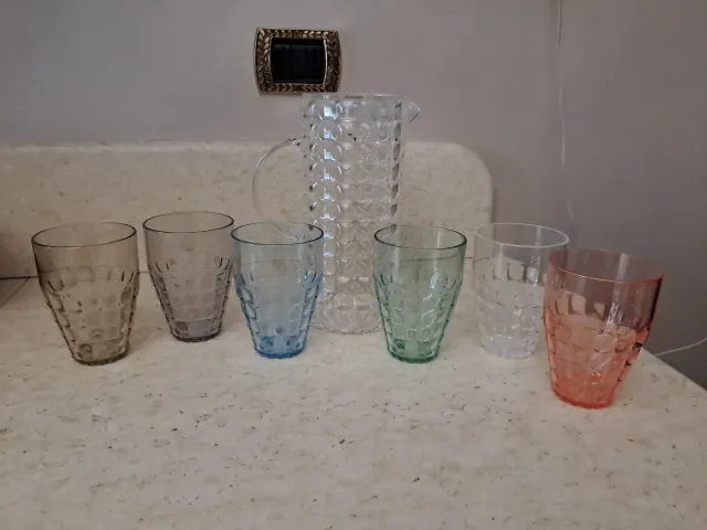 Set 6 Bicchieri + Caraffa Guzzini