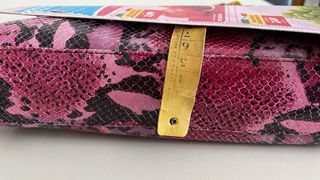 Borsa Nicoli rettile fucsia e nera