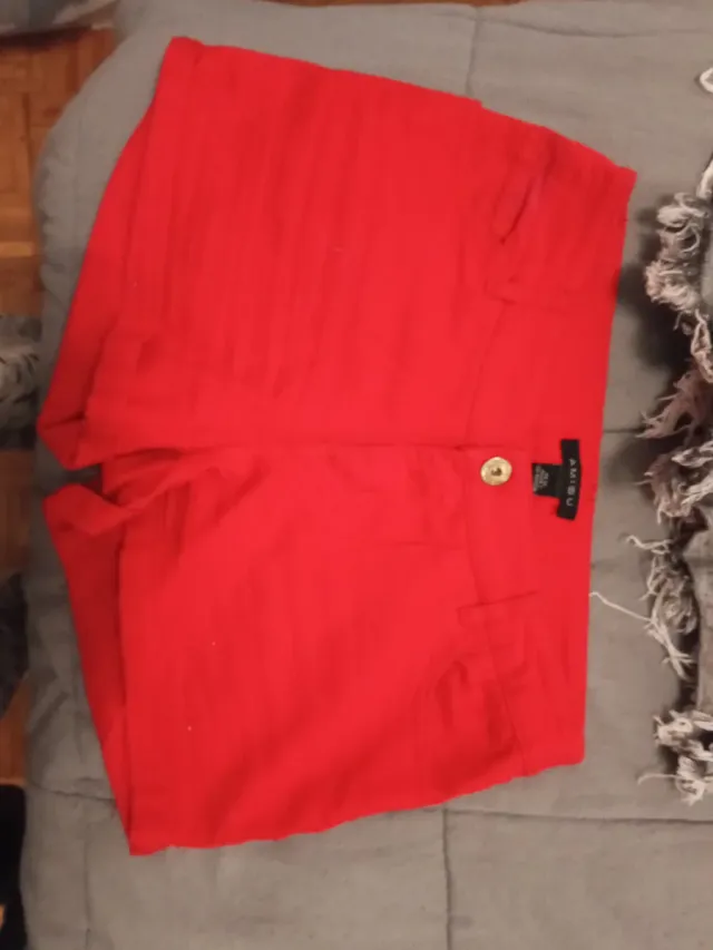 Pantalones vaqueros rotos talla 32