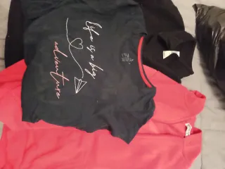 Ropa negra talla 10 y rosa  talla 14 de regalo