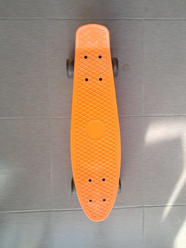 Skate Penny Naranja totalmente nuevo.