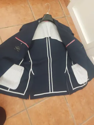 Americana juvenil azul con coderas