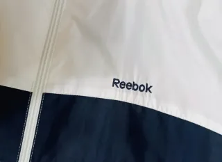 Chaqueta deportiva Reebok blanca y azul
