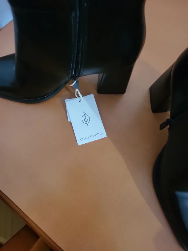 Botas altas negras de tacón