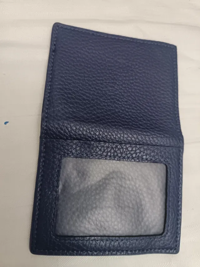 Monederos azules de piel