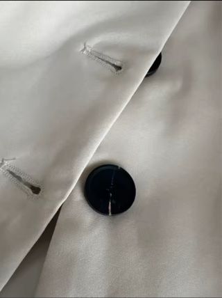 Traje elegante top y pantalón beige