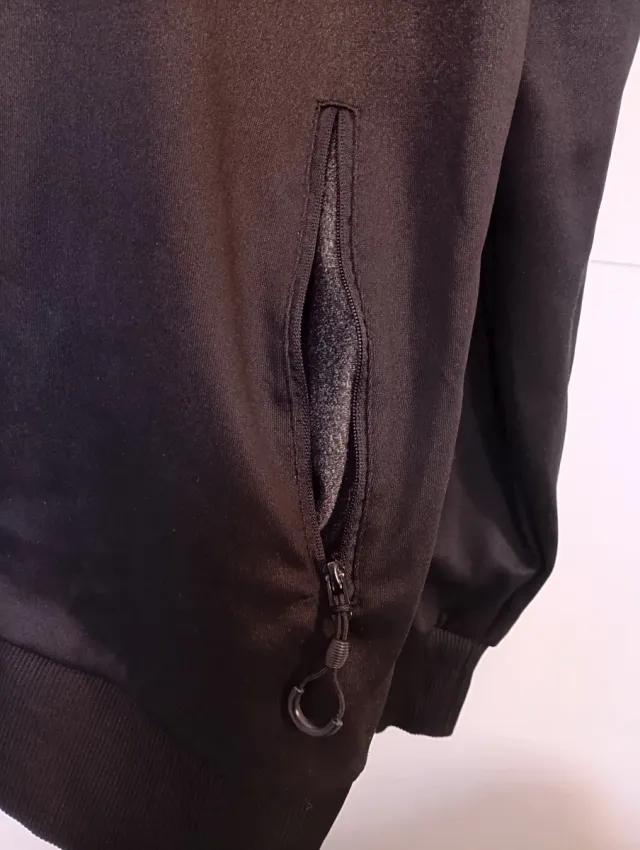 Chaqueta Nike cremallera gris y negra con capucha