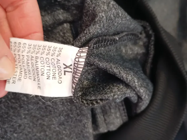 Chaqueta Nike cremallera gris y negra con capucha