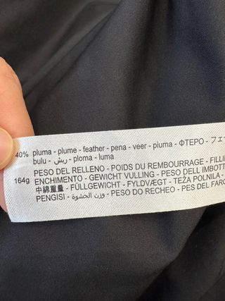 Plumífero Zara verde con capucha y pelo