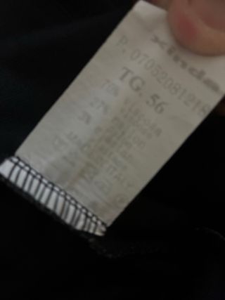 Pantaloni a quadri grigi e neri