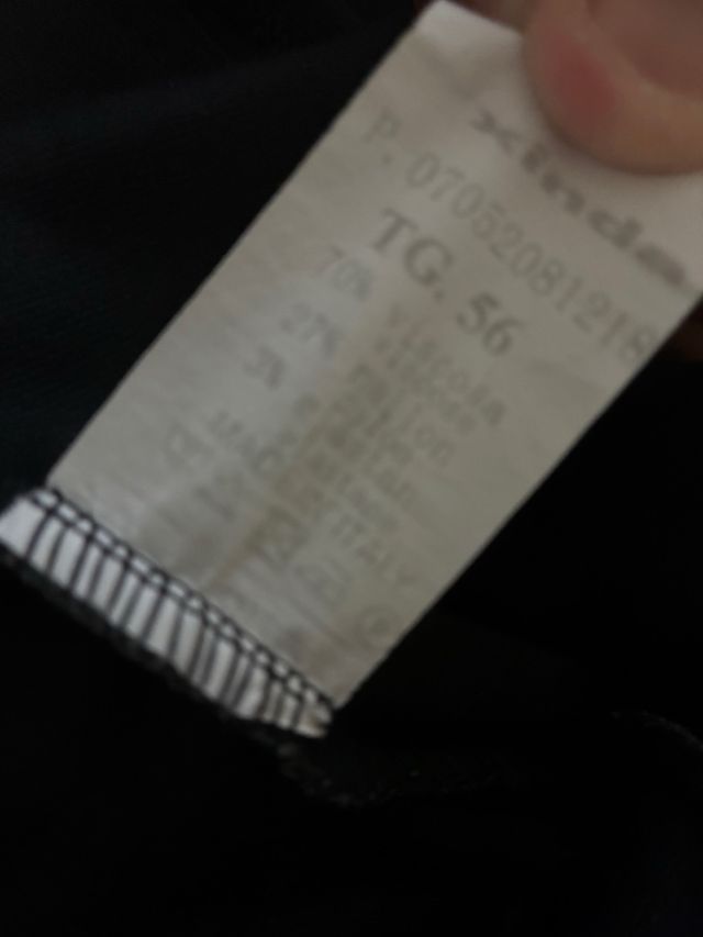 Pantaloni a quadri grigi e neri