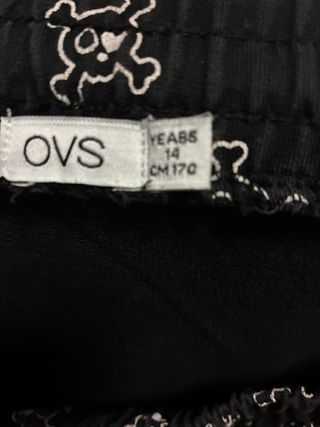 Pantaloni neri con stampa teschio