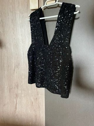 Blusa de lentejuelas negra