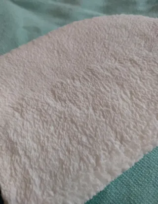 Guanto per la pulizia del corpo. Esfoliante leviga