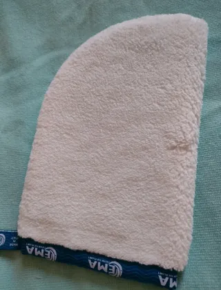 Guanto per la pulizia del corpo. Esfoliante leviga