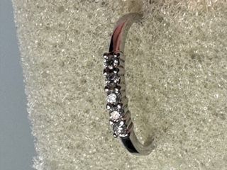 Sortija oro blanco 18 k., y 5 diamantes talla 13