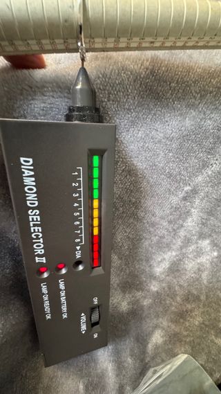 Sortija oro blanco 18 k., y 5 diamantes talla 13