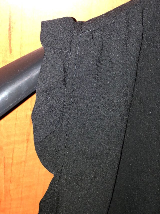 Casacca nera con fiocco