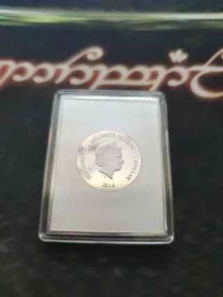 Moneda cuadrada 1$ 2014 Islas Salomón El Grito