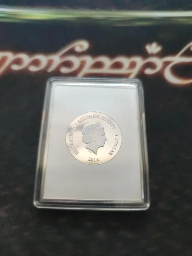 Moneda cuadrada 1$ 2014 Islas Salomón El Grito